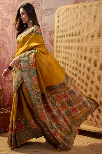 Mustard viscose silk position print saree with contrast blouse piece