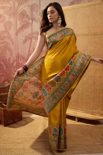 Mustard viscose silk position print saree with contrast blouse piece