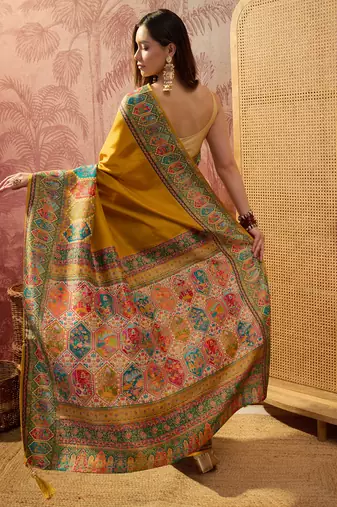 Mustard viscose silk position print saree with contrast blouse piece