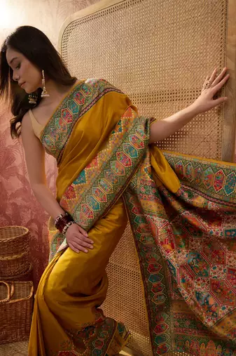 Mustard viscose silk position print saree with contrast blouse piece