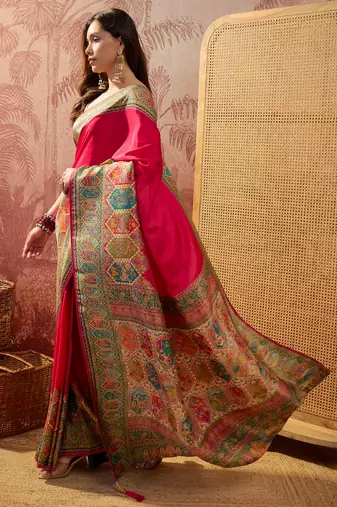 Pink viscose silk position print saree with contrast blouse piece