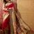 Pink viscose silk position print saree with contrast blouse piece