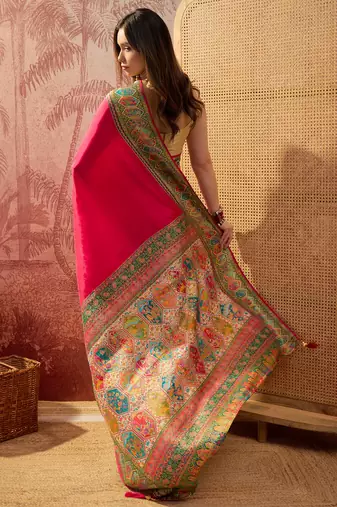 Pink viscose silk position print saree with contrast blouse piece