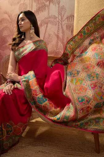 Pink viscose silk position print saree with contrast blouse piece