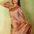 Orange viscose silk position print saree with matching blouse piece