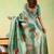 Teal viscose silk position print saree with matching blouse piece