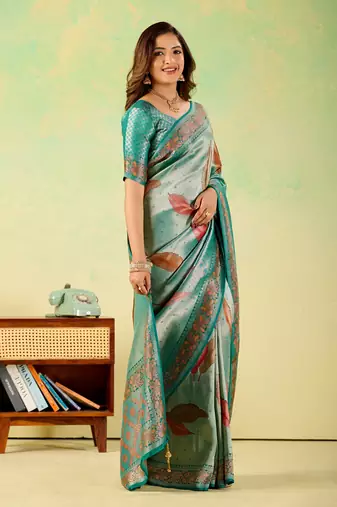 Teal viscose silk position print saree with matching blouse piece