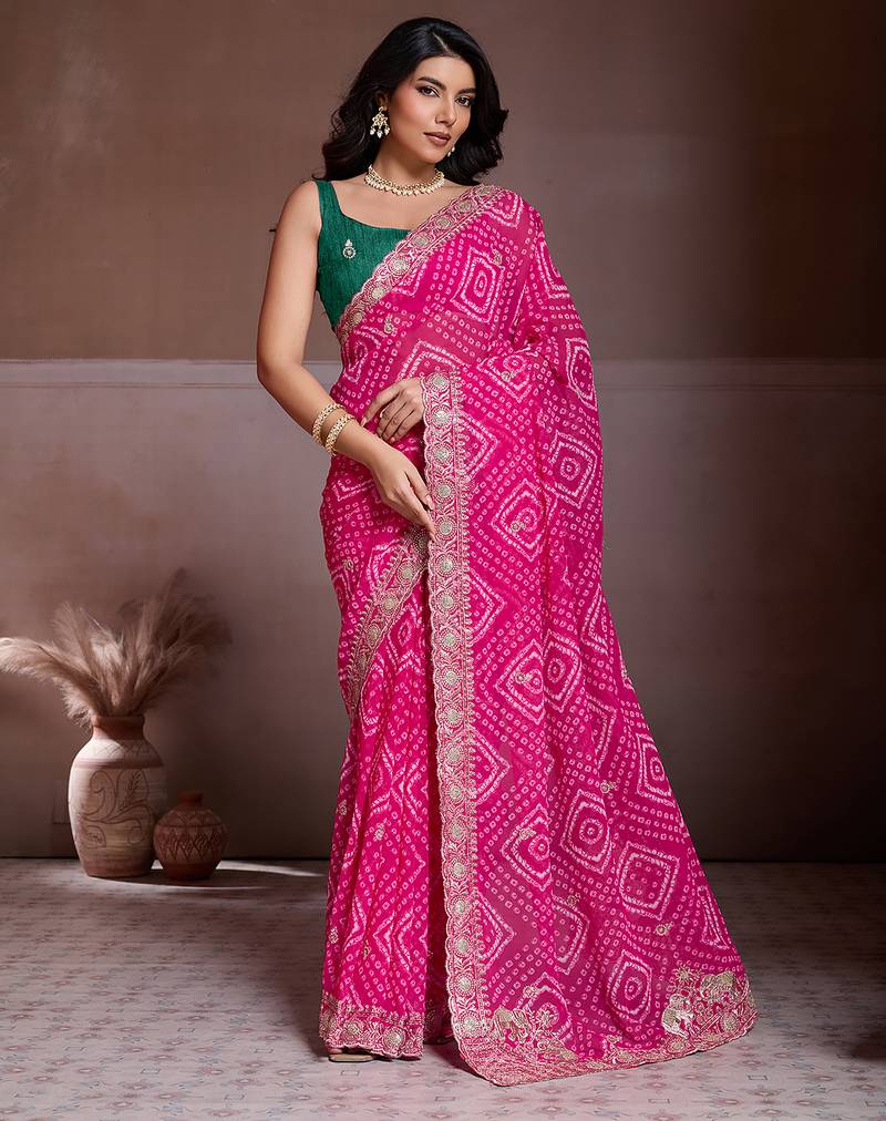 Pink color georgette bandhej embroidery work saree with work blouse piece