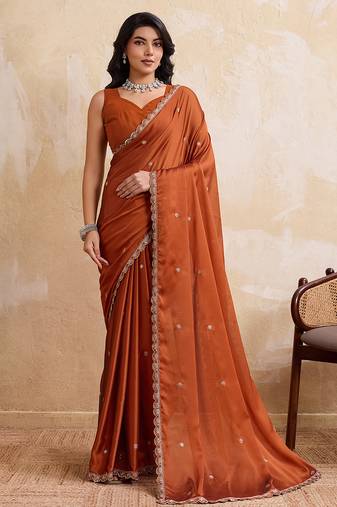 Rust color  silk party wear saree with plain blouse piece