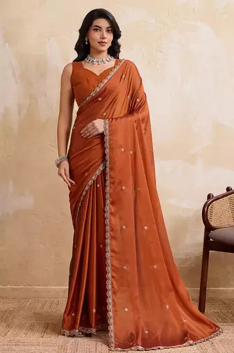 Rust color  silk party wear saree with plain blouse piece