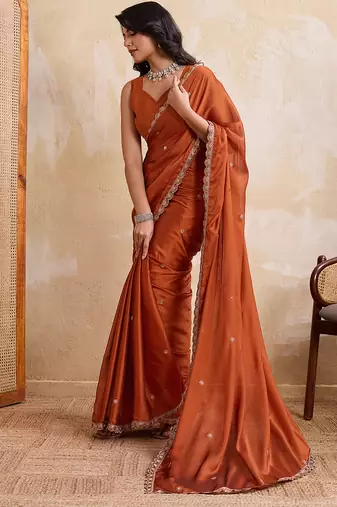 Rust color  silk party wear saree with plain blouse piece