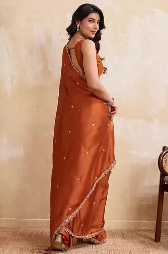 Rust color  silk party wear saree with plain blouse piece