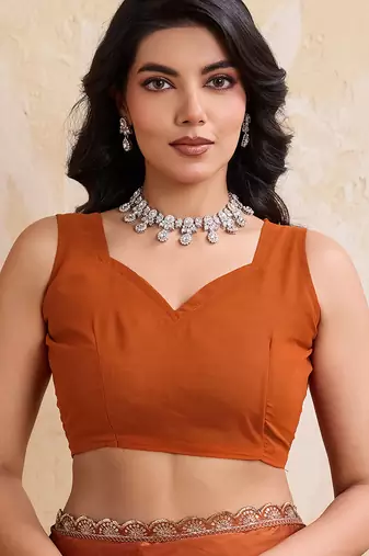 Rust color  silk party wear saree with plain blouse piece