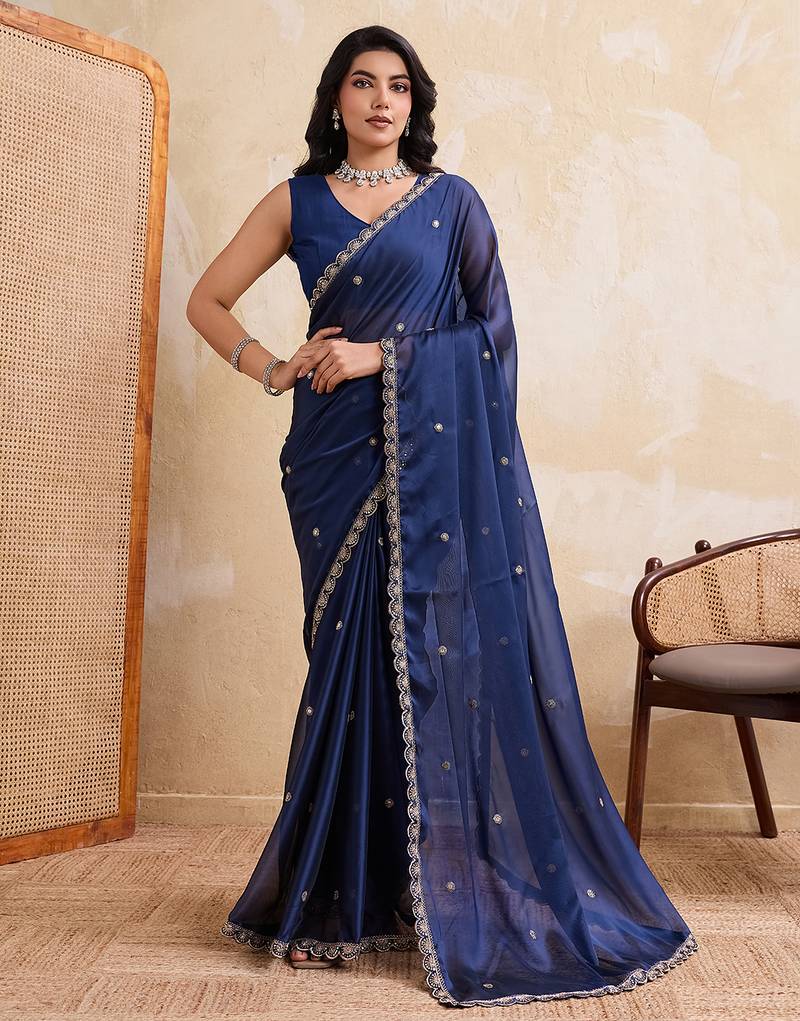 Navyblue color rangoli silk party wear saree with plain blouse piece