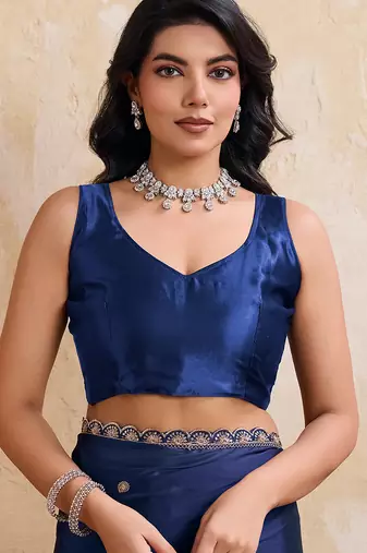 Navyblue color rangoli silk party wear saree with plain blouse piece