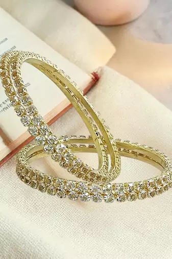 Gold plated set of 4 cubic zircon bangles