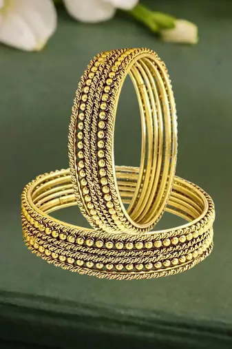 Antique gold plated set of 12 beaded textured bangles