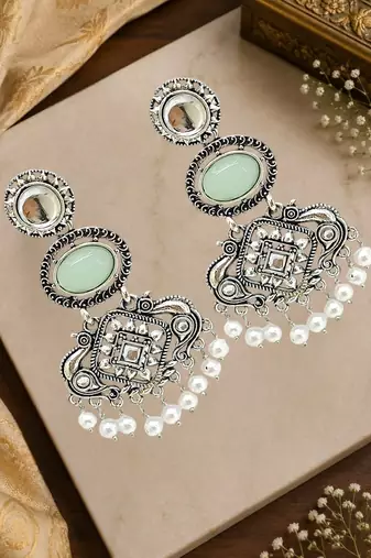 Silver oxidised kundan mint green long earrings