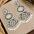 Silver oxidised kundan mint green long earrings