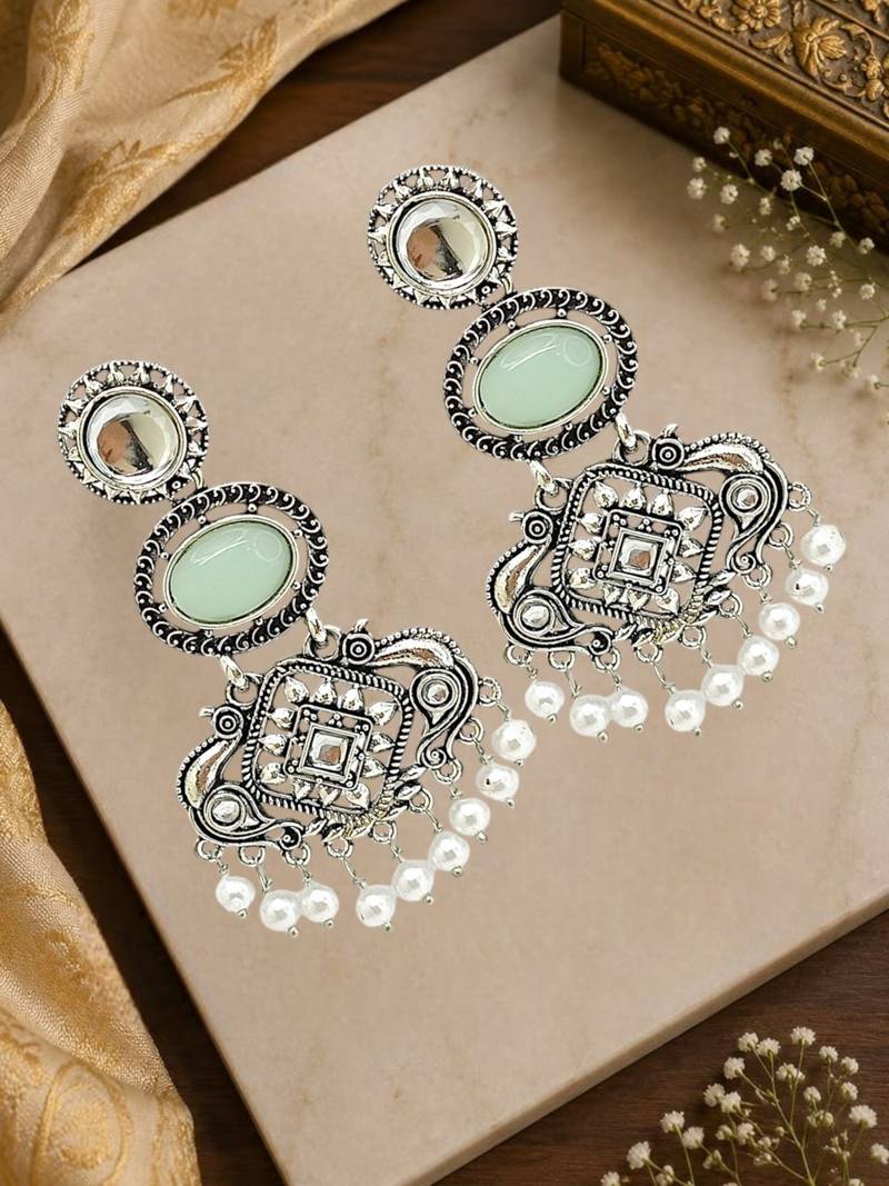 Silver oxidised kundan mint green long earrings