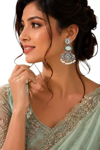 Silver oxidised kundan mint green long earrings