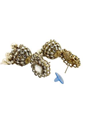 Antique gold plated kundan dome jhumka earrings 3