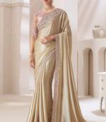 Light golden embroidery fency fabric party wear saree with blouse piece