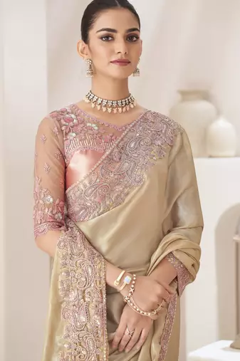 Light golden embroidery fancy fabric party wear saree with blouse piece