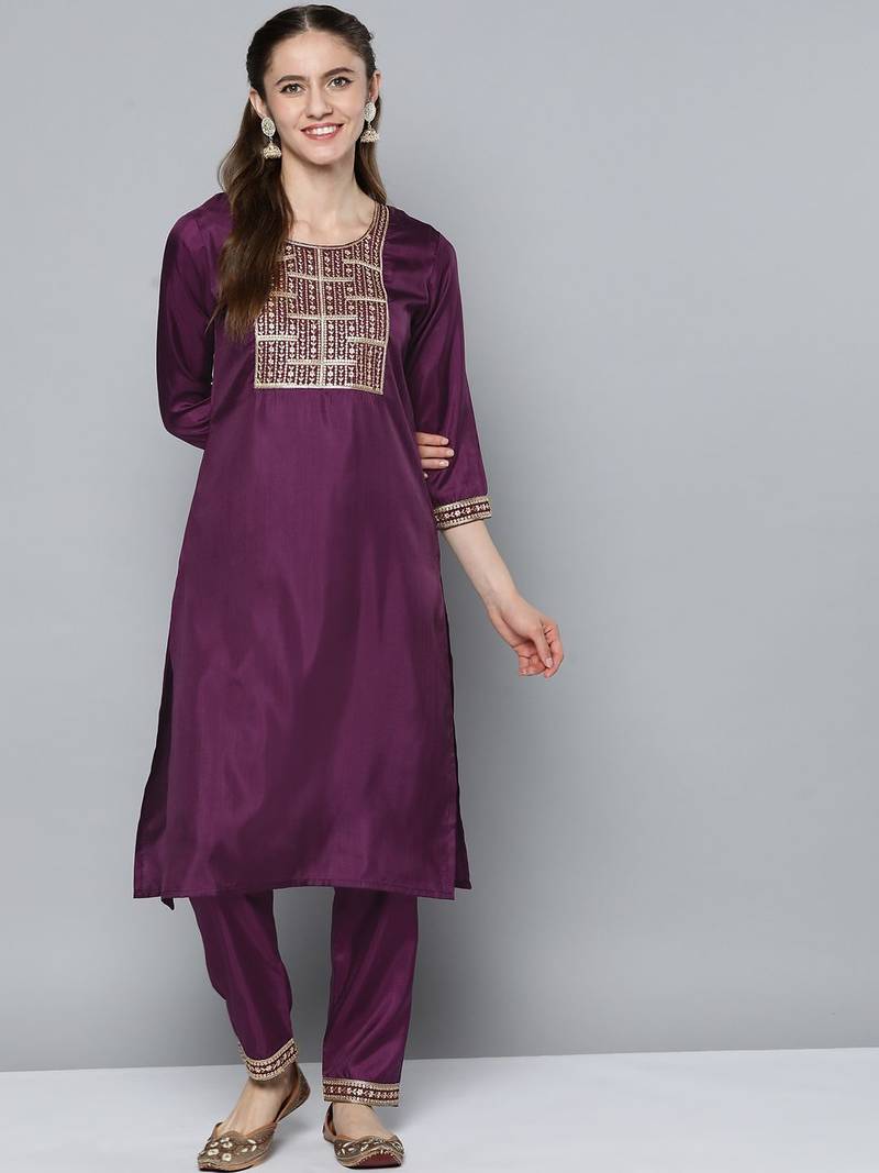 Women purple ethnic motifs embroidered sequinned kurta with trousers
