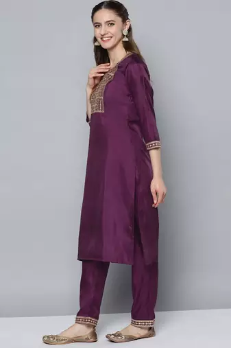 Women purple ethnic motifs embroidered sequinned kurta with trousers