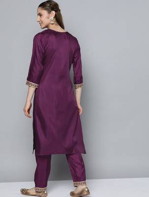 Women purple ethnic motifs embroidered sequinned kurta with trousers 5