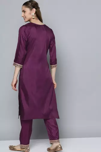 Women purple ethnic motifs embroidered sequinned kurta with trousers