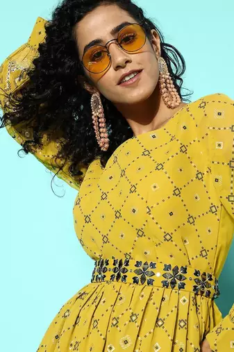 Women printed regular mirror work kurta with palazzos
