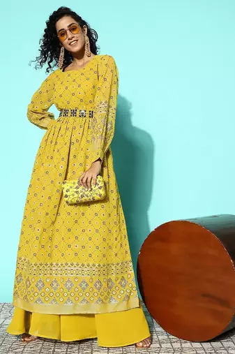 Women printed regular mirror work kurta with palazzos