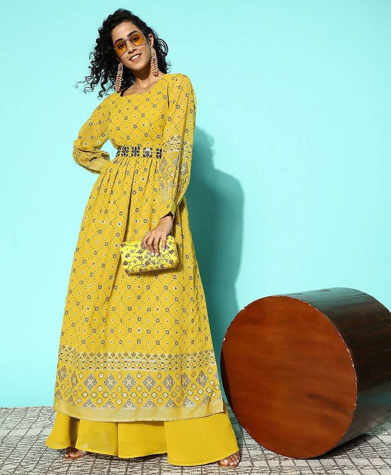 Women printed regular mirror work kurta with palazzos
