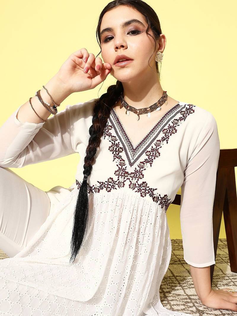 Women floral embroidered high slit sequinned kurta with trousers