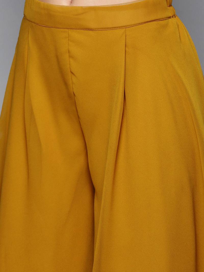 Women mustard yellow & golden embroidered pleated kurti with palazzos & dupatta