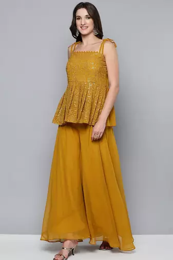 Women mustard yellow & golden embroidered pleated kurti with palazzos & dupatta