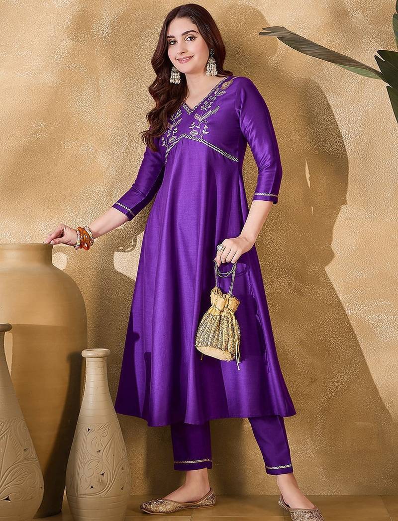 Women solid embroidered a-line kurta with trousers