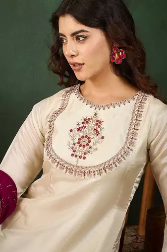 Round neck embroidered a-line kurta sets