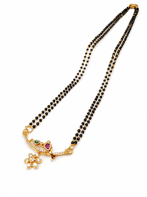 Traditional double strand black bead mangalsutra with gold-toned floral cz pendant, ruby & emerald accents 1