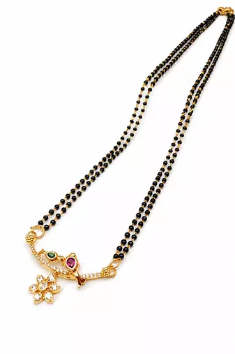 Traditional double strand black bead mangalsutra with gold-toned floral cz pendant, ruby & emerald accents