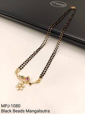 Traditional double strand black bead mangalsutra with gold-toned floral cz pendant, ruby & emerald accents 4