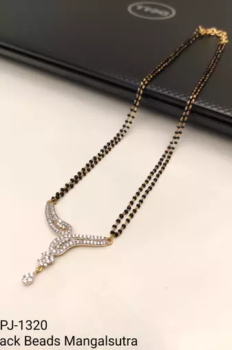 Double strand black bead mangalsutra with cz stone gold-toned pendant, traditional indian jewellery