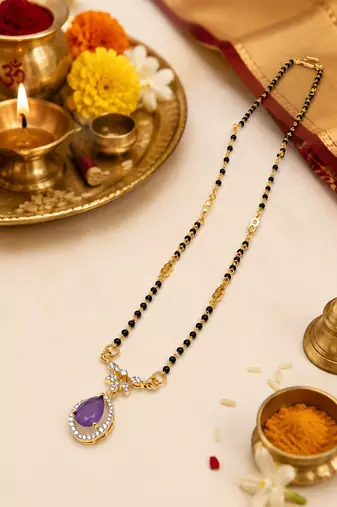 Gold-plated mangalsutra with purple teardrop pendant, black beads chain, cz stone, traditional indian jewellery