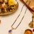 Gold-plated mangalsutra with purple teardrop pendant, black beads chain, cz stone, traditional indian jewellery