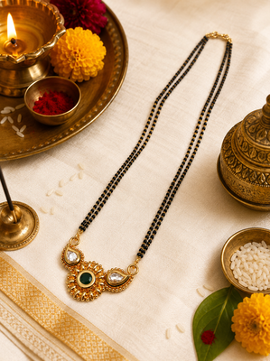 Traditional mangalsutra with double strand black beads, gold-toned kundan pendant, green stone 3