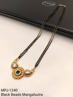 Traditional mangalsutra with double strand black beads, gold-toned kundan pendant, green stone 5