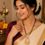 Gold-toned double strand black bead mangalsutra with chandbali pendant, pearl and kundan embellishments