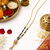 Gold-plated mangalsutra with black beads, long chain, filigree ball pendant with tassel, traditional indian jewellery